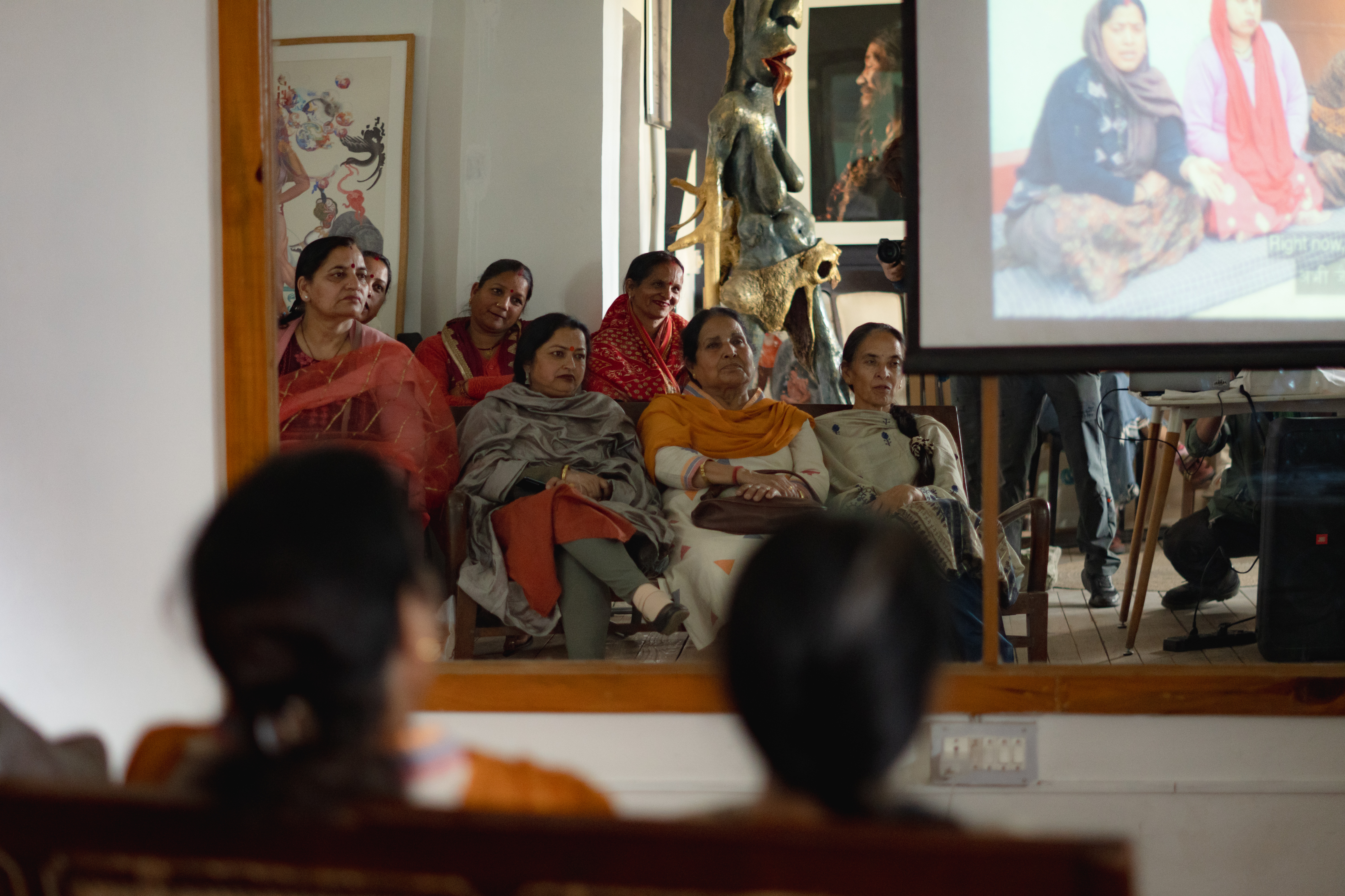 People Sitting Watching Film
